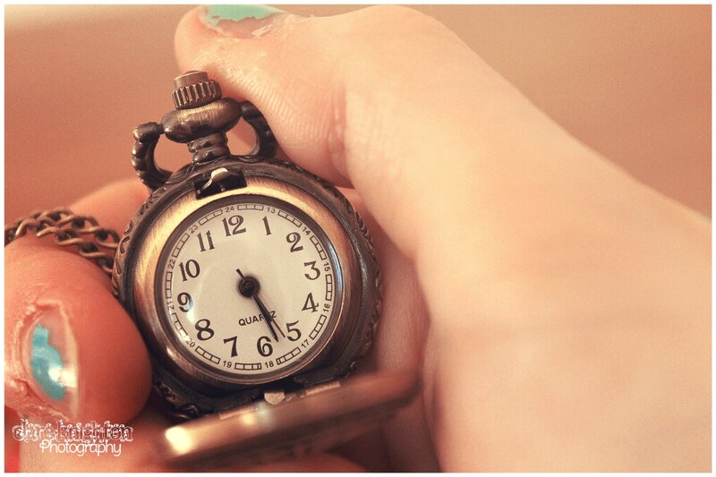 Hand Holding Pocket Watch — Beige