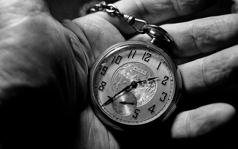 Hand Holding Pocket Watch — Black, Dramatic