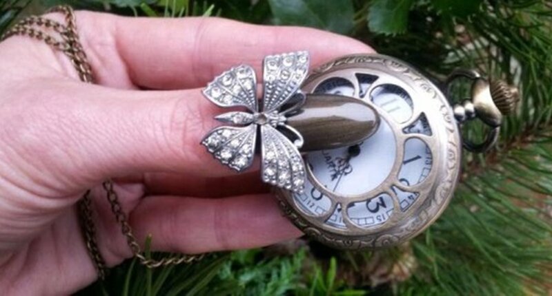 Hand Holding Pocket Watch — Green