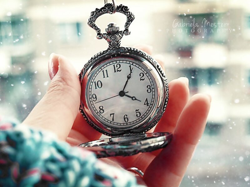 Hand Holding Pocket Watch — White, Serene, Winter