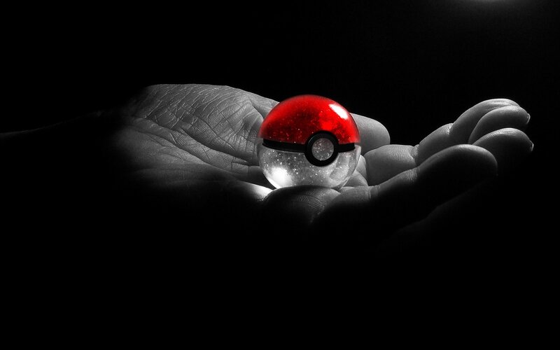 Hand Holding Pokeball — Black, Dramatic