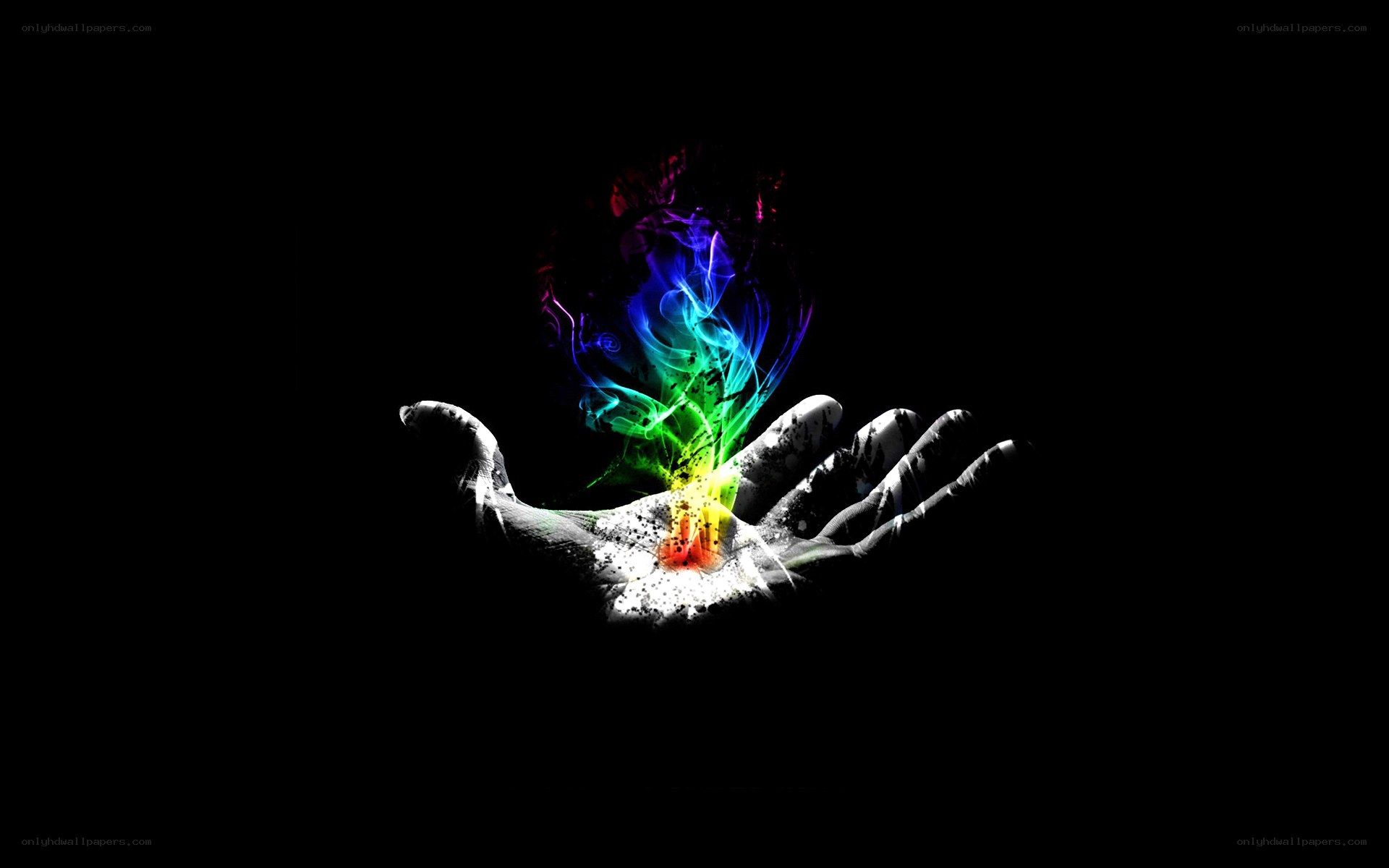 hand holding rainbow energy