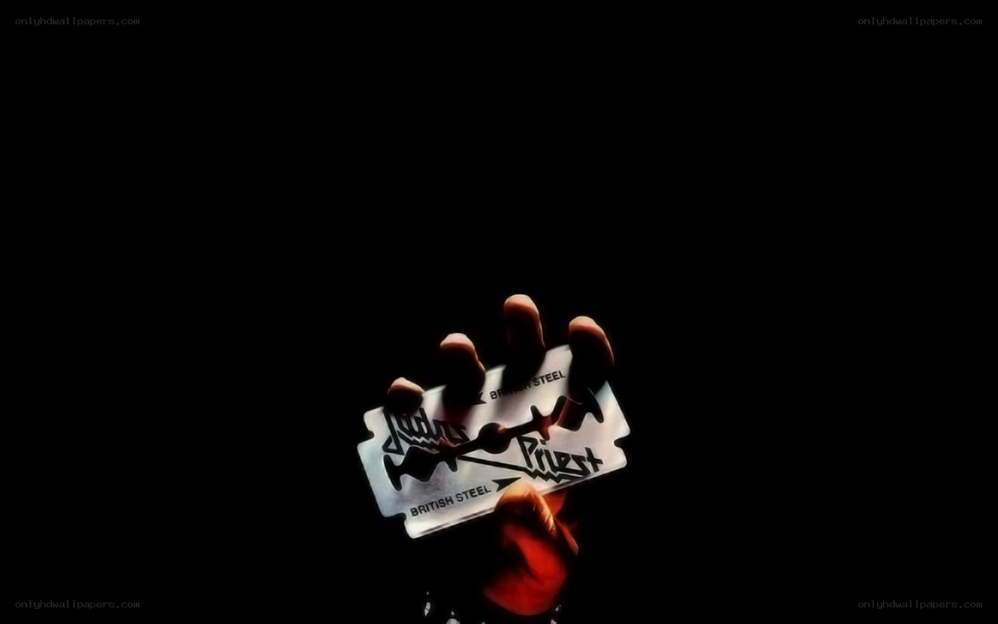 hand holding razor blade