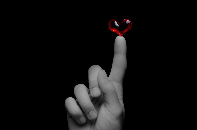 Hand Holding Red Heart — Black, Dramatic, Photograph