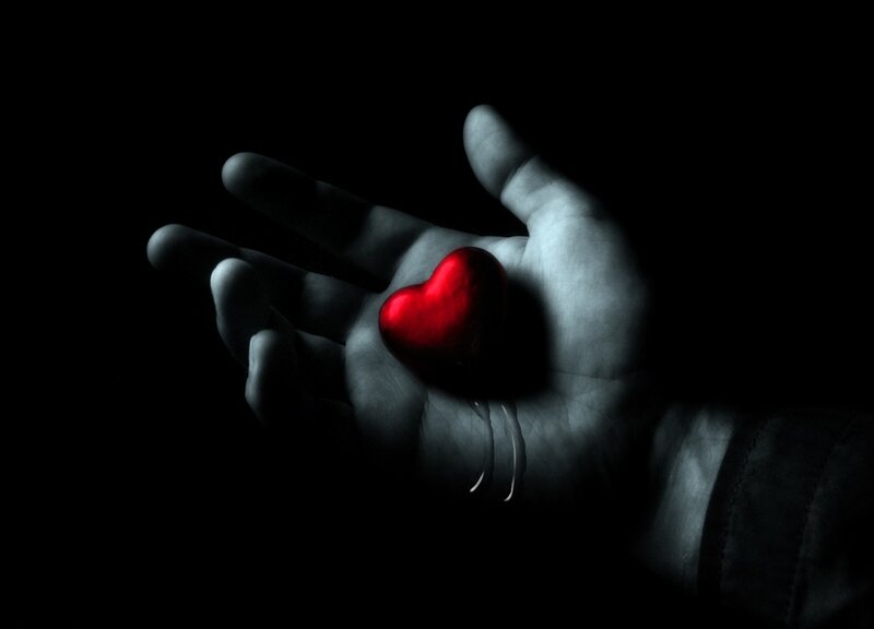 Hand Holding Red Heart — Black