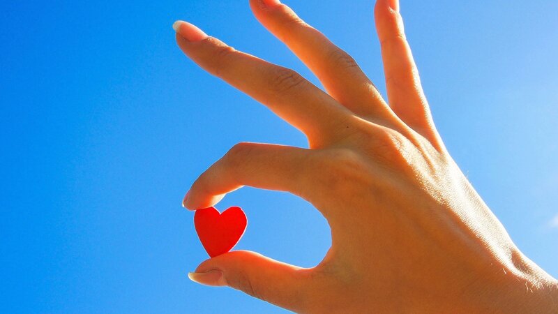 Hand Holding Red Heart — Blue, Serene