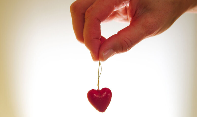 Hand Holding Red Heart — Calm, Photograph, String