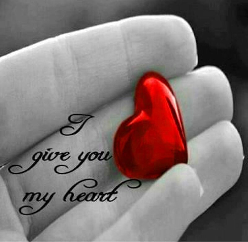 Hand Holding Red Heart — Sentimental, Photograph, Text