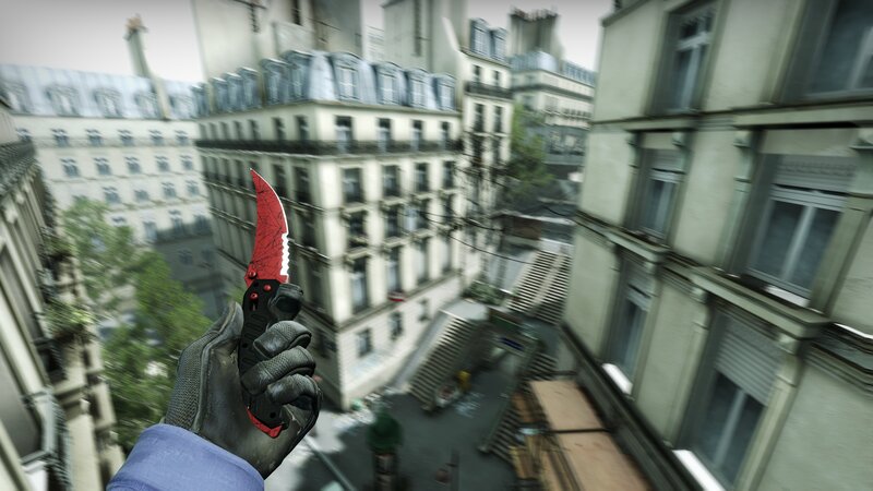 Hand Holding Red Knife