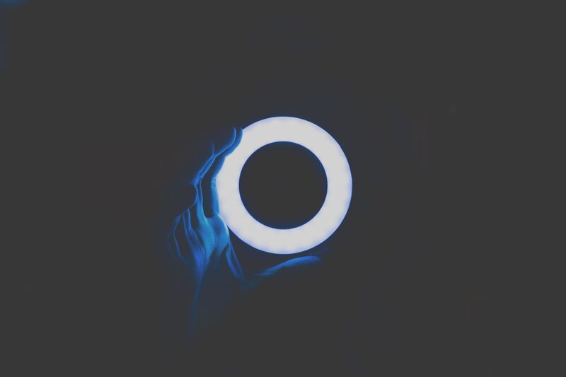 hand holding ring light