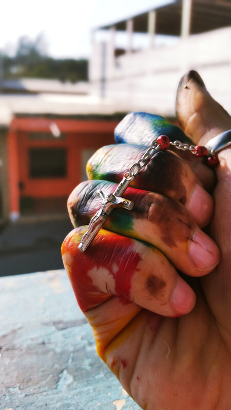 Hand Holding Rosary — Red