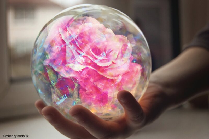 Hand Holding Rose Sphere