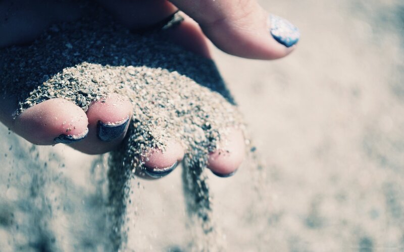 hand holding sand