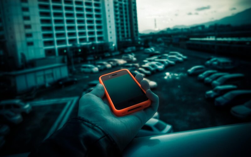 Hand Holding Smartphone — Blue, Dramatic, Night