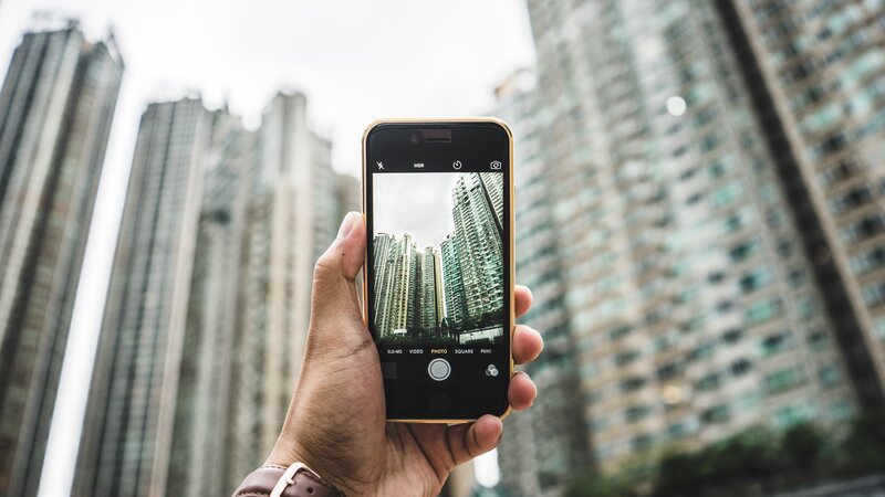 Hand Holding Smartphone — Gray