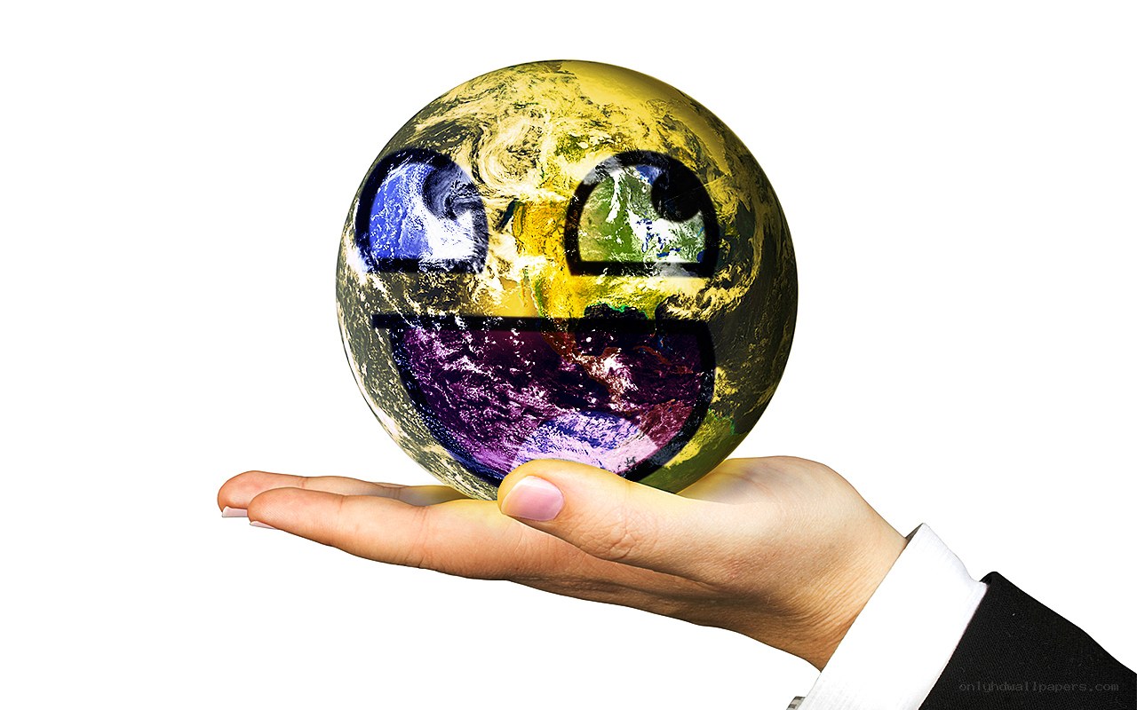 hand holding smiling earth