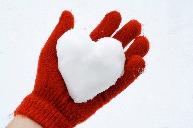 Hand Holding Snow Heart — Red