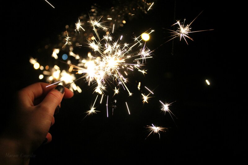Hand Holding Sparkler — Black