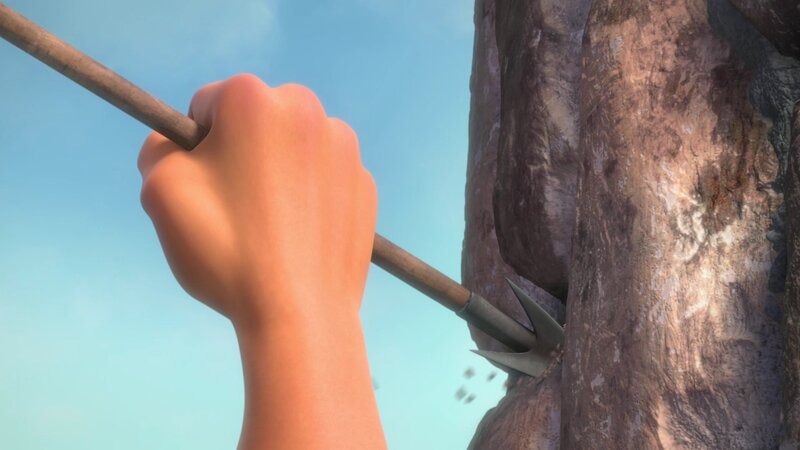 hand holding spear against rock