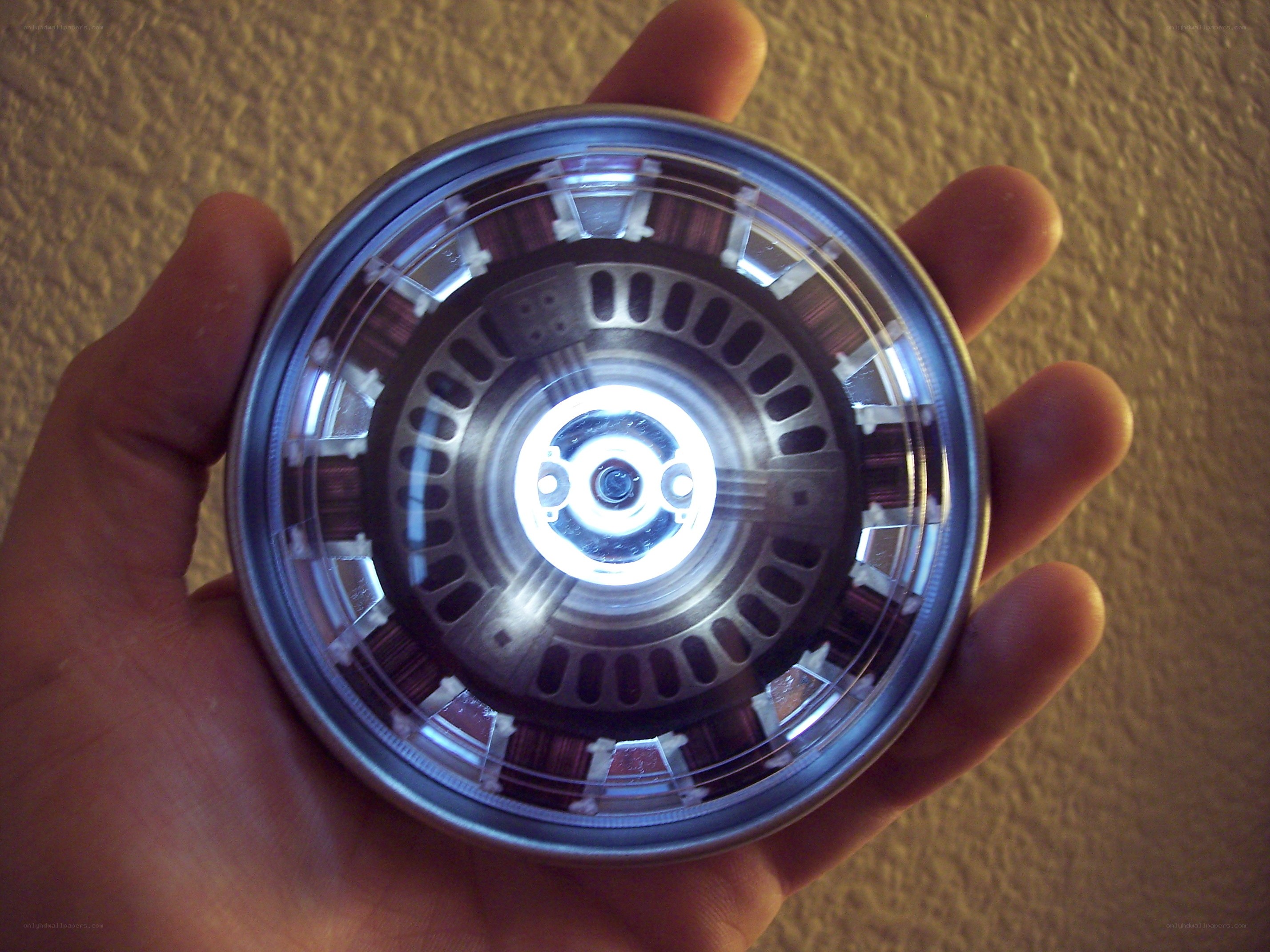 hand holding spinning top