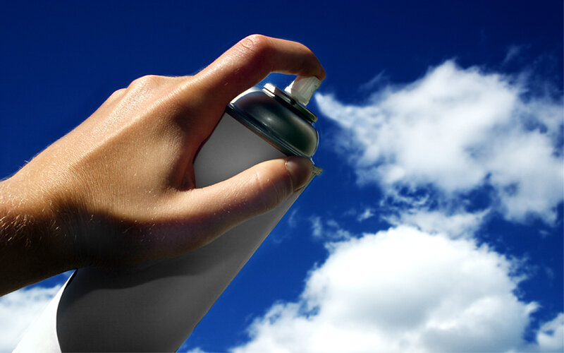 Hand Holding Spray Can — Blue, Dramatic, Afternoon