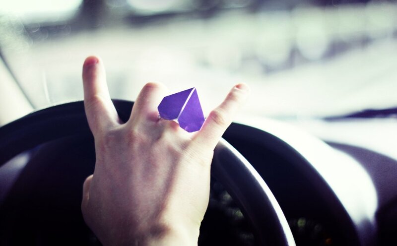 Hand Holding Steering Wheel