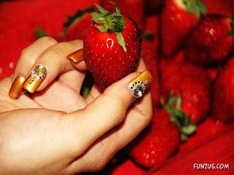 Hand Holding Strawberry — Red, Bright