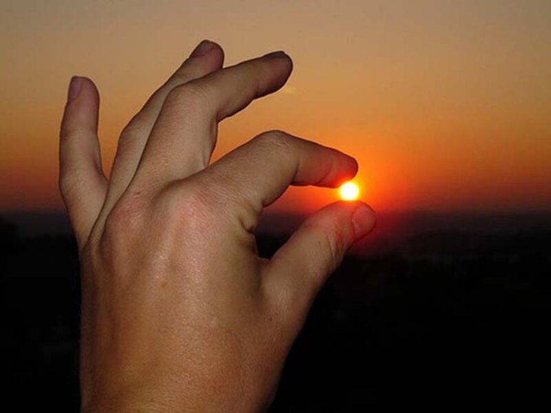 Hand Holding Sun