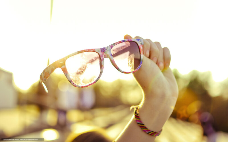Hand Holding Sunglasses — Yellow