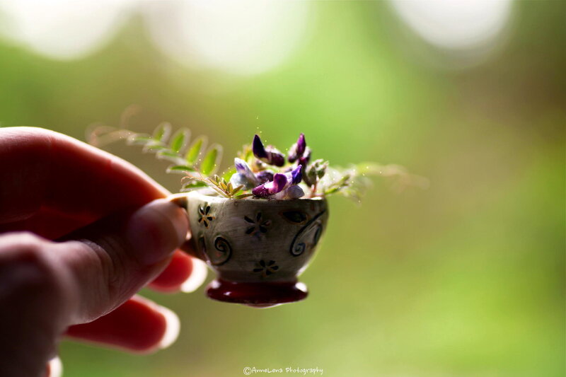 Hand Holding Teacup