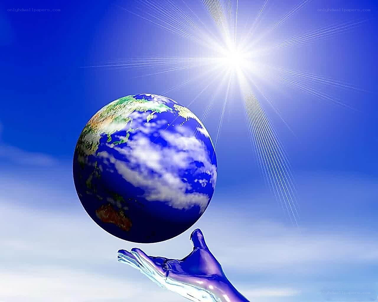 hand holding the earth