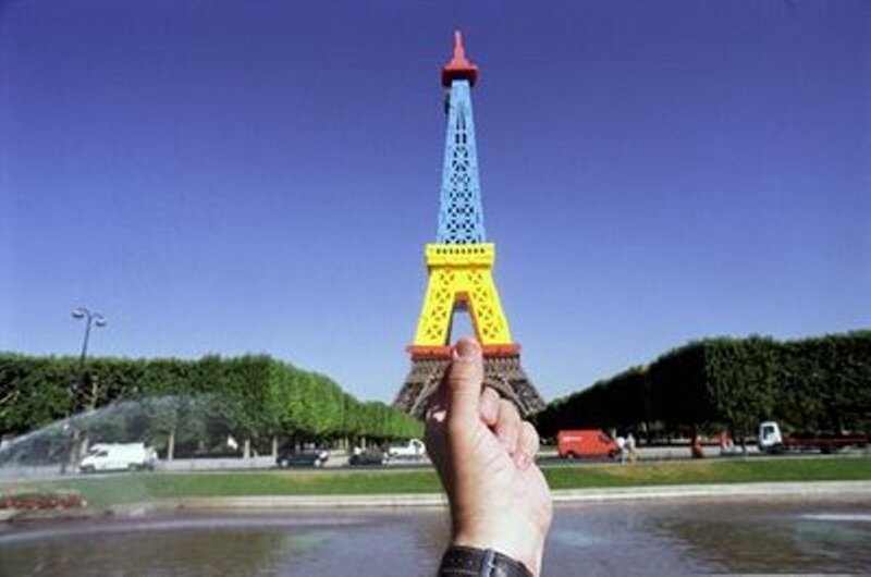 Hand Holding Toy Tower