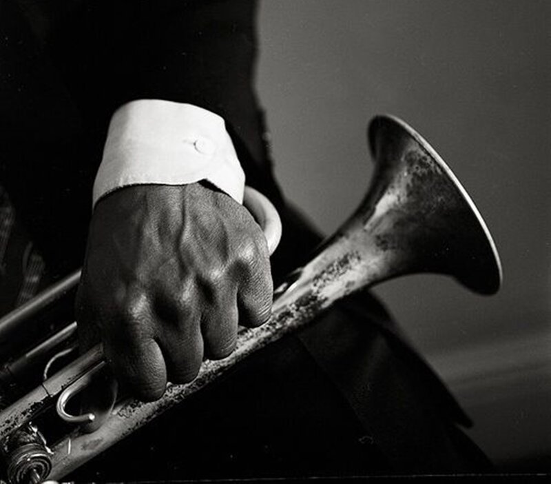 Hand Holding Trumpet