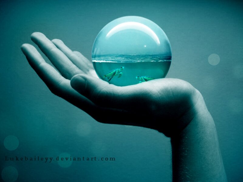 Hand Holding Water Sphere — Teal