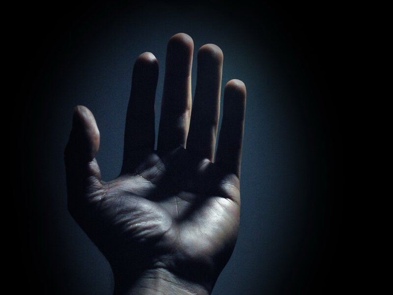 hand in dark light