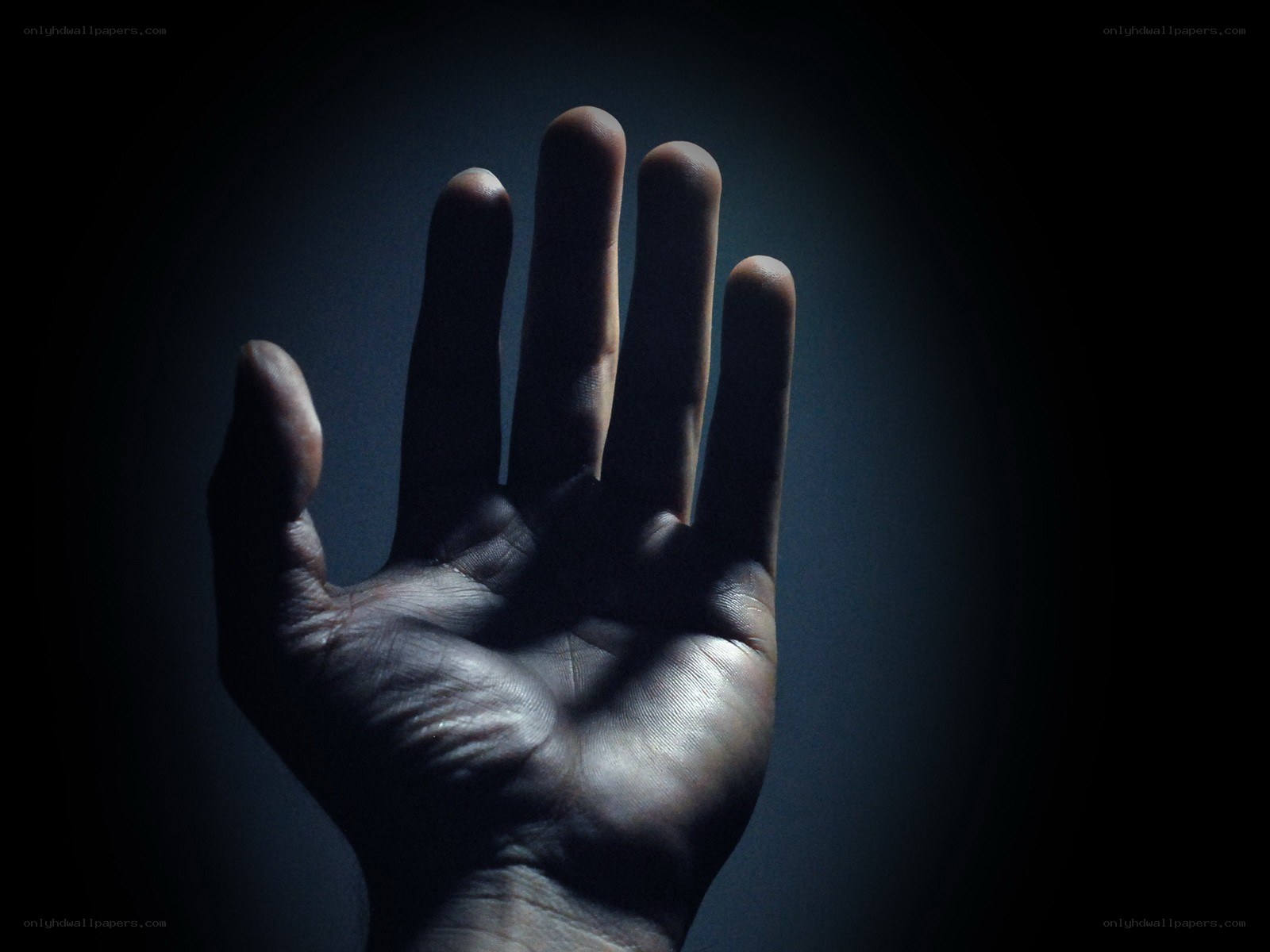 hand in dark light