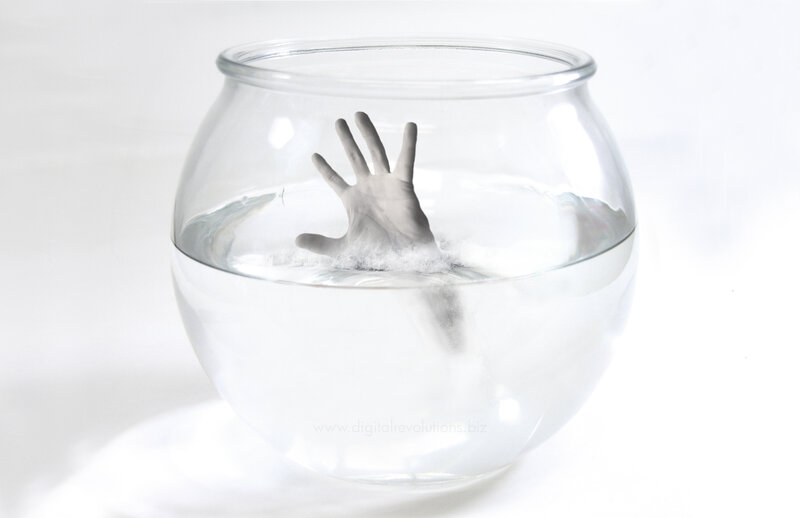 hand in fishbowl