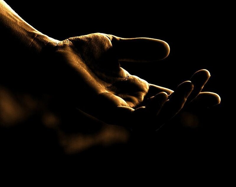 Hand in golden light