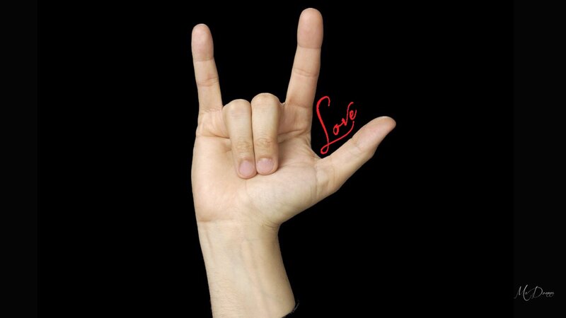 Hand Making Rock Gesture
