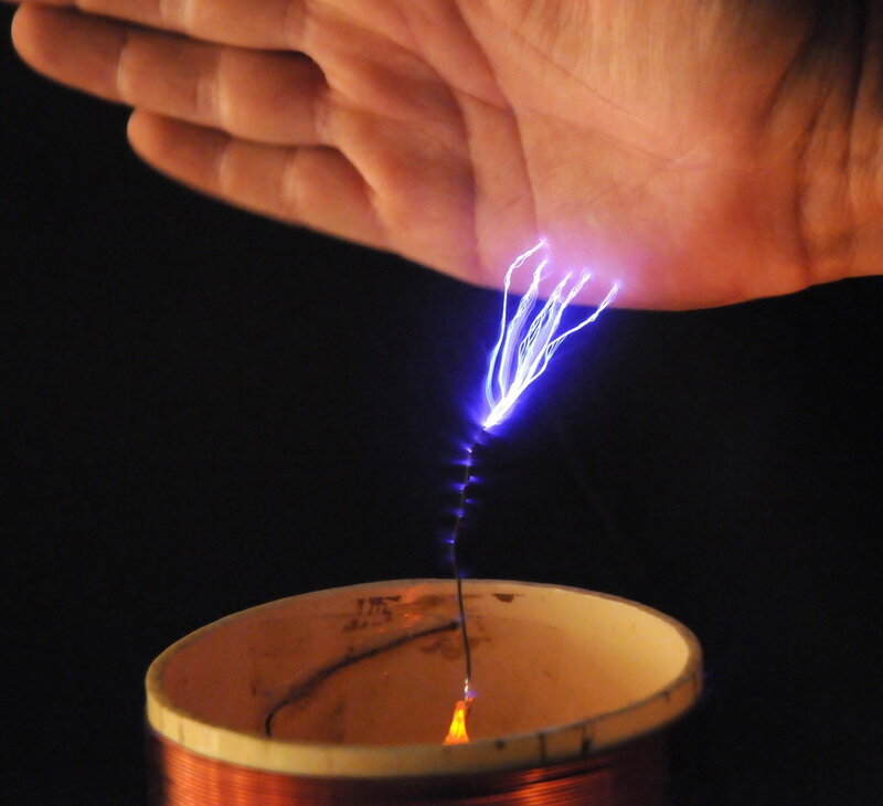 Hand Near Electric Arc
