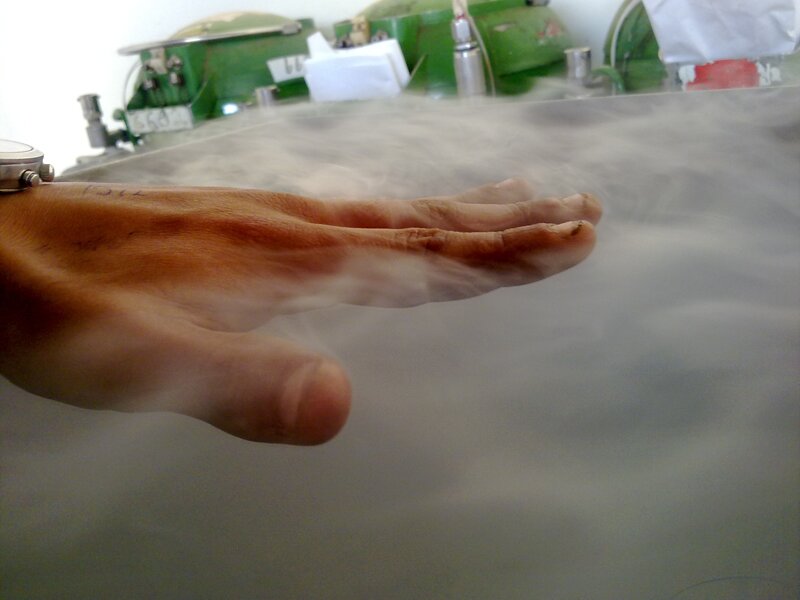 hand near vapor in lab