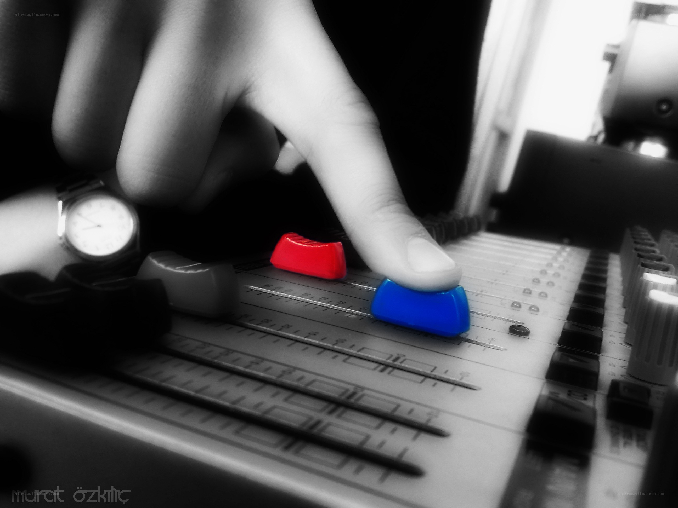 hand on audio mixer