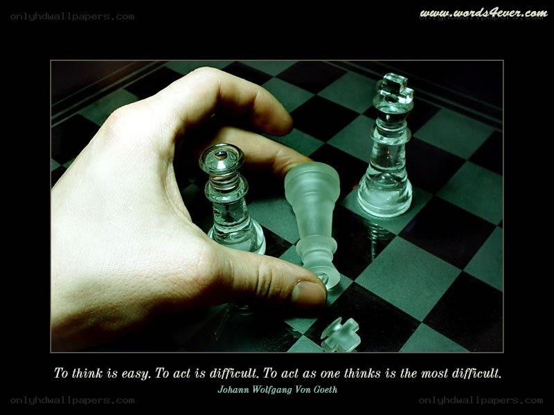 hand on chessboard