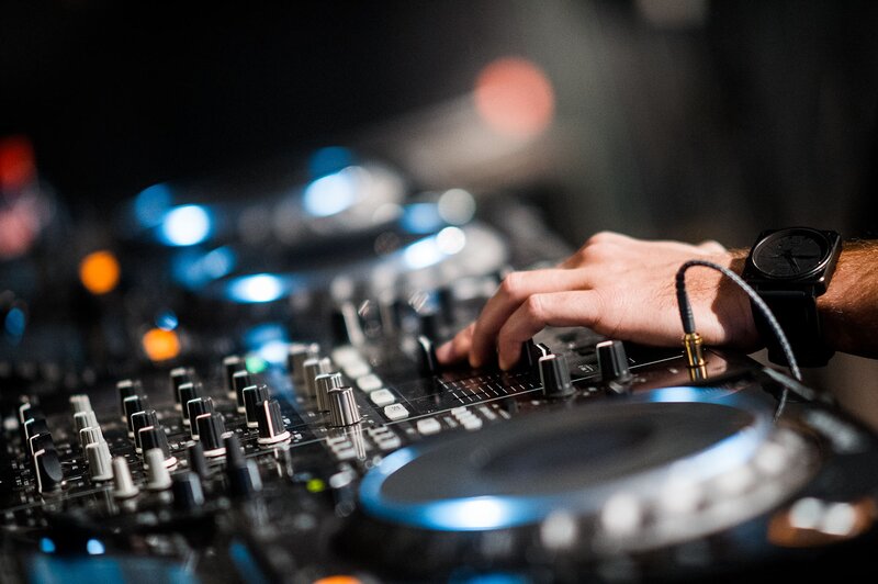 Hand on Dj Mixer — Black, Focused, Night