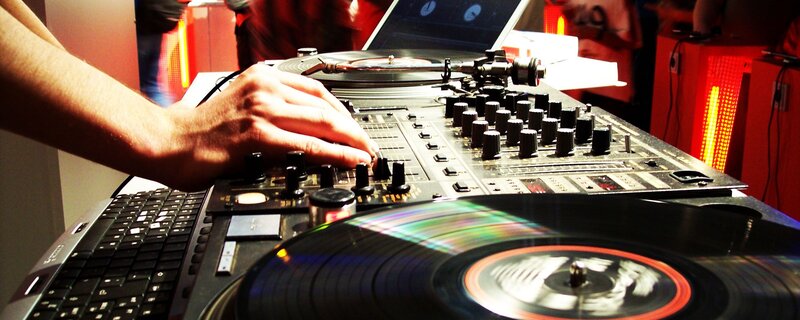 Hand on DJ Mixer — Black