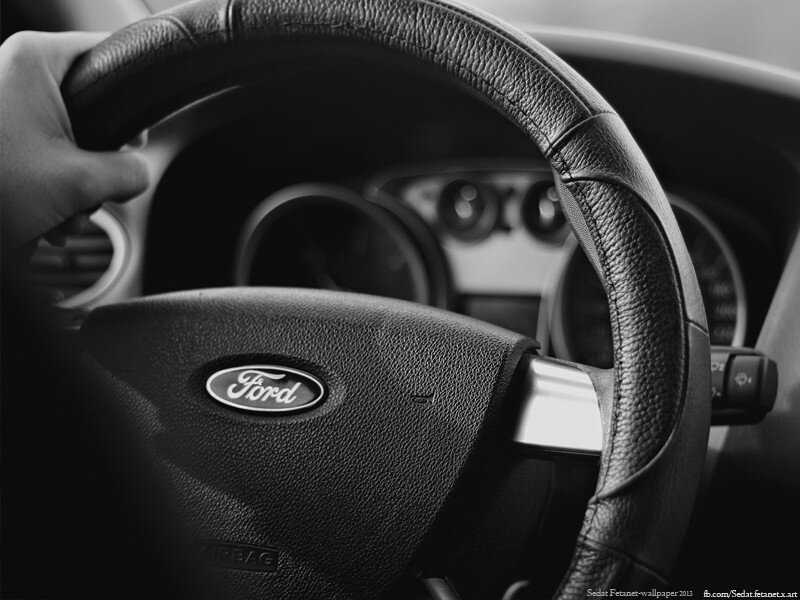 Hand on Steering Wheel