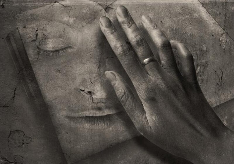 Hand on Stone Face