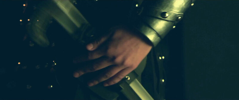 hand on sword hilt