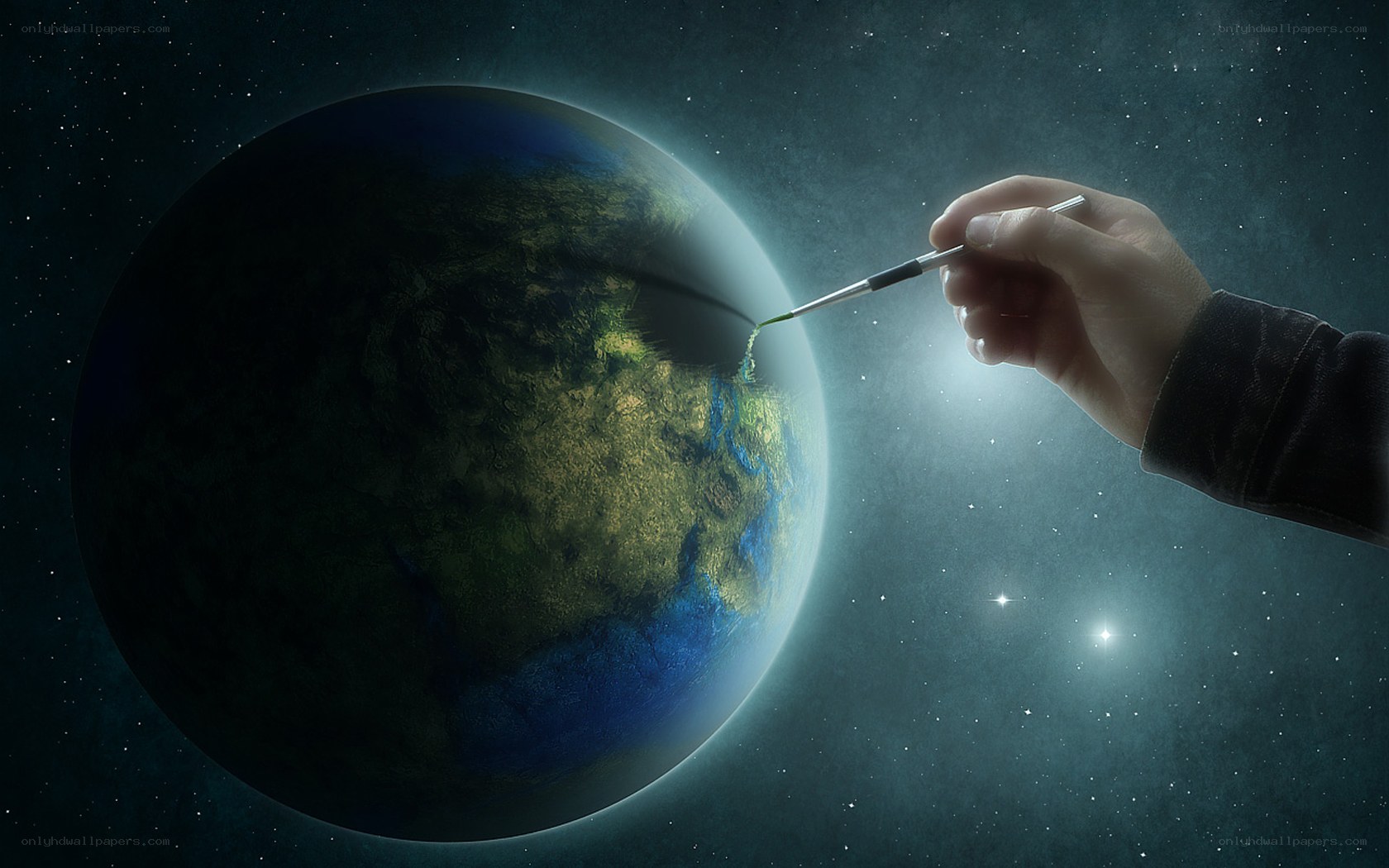 hand painting a planet
