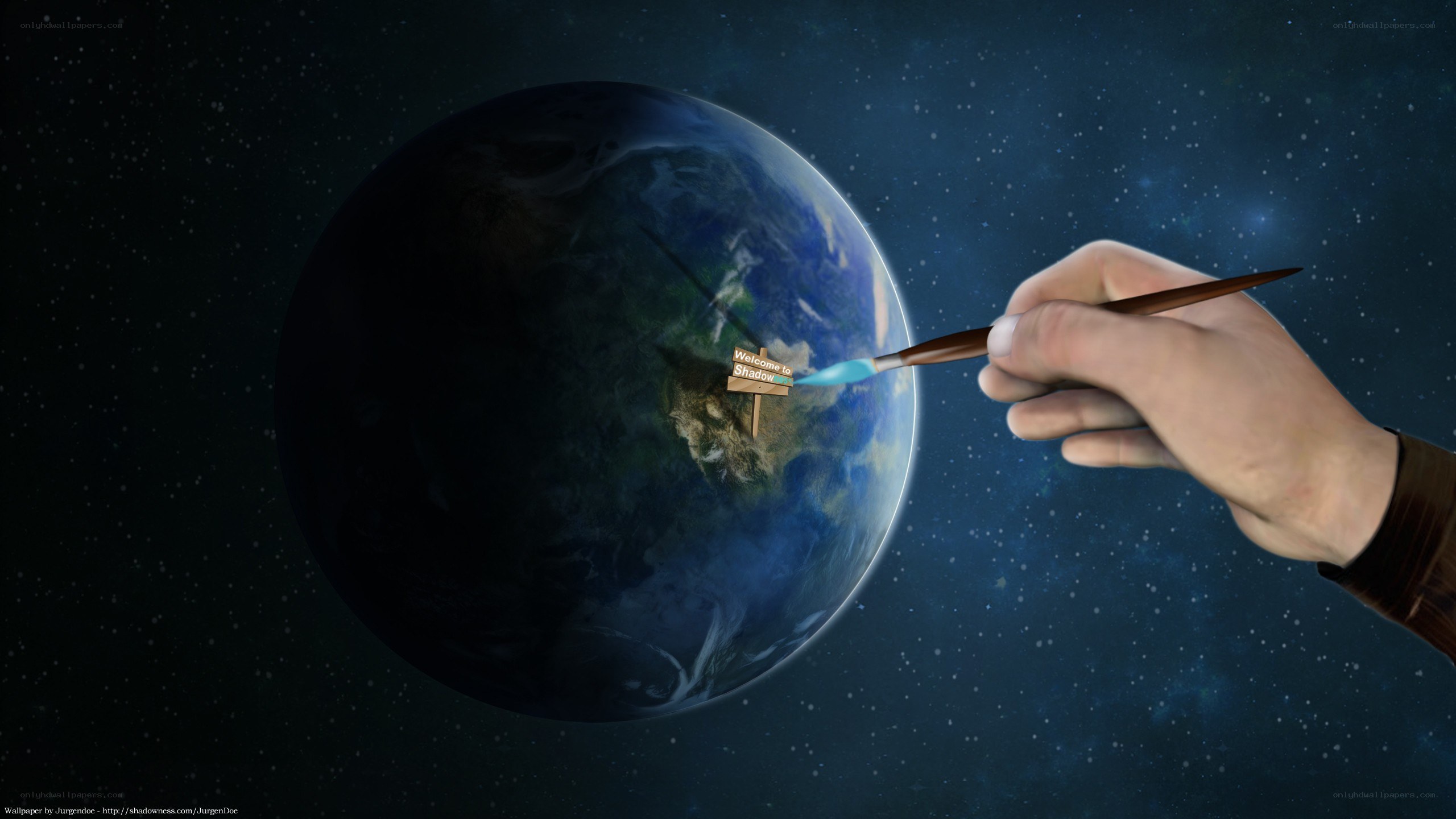 hand painting earth with sign